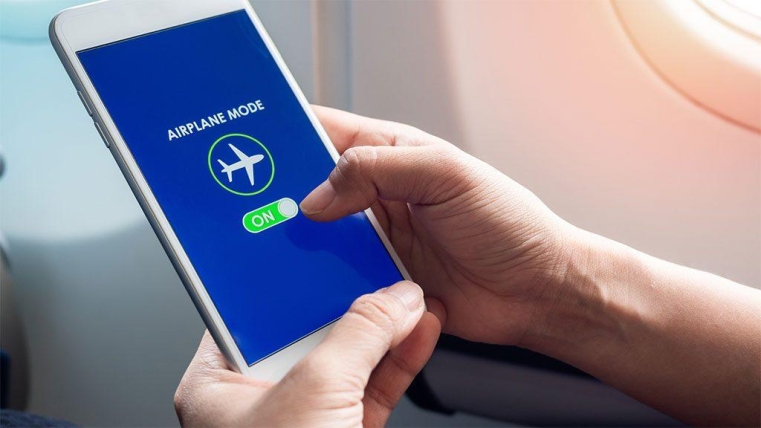 Here’s the real reason to turn on airplane mode when you fly